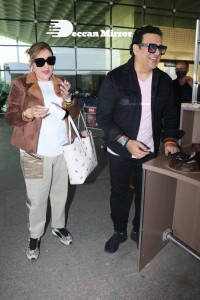 Bollywood Superstar Govinda Surprised by Photographers with a Birthday Cake at Airport on December 20