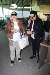 Bollywood Superstar Govinda Surprised by Photographers with a Birthday Cake at Airport on December 20