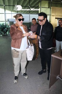 Bollywood Superstar Govinda Surprised by Photographers with a Birthday Cake at Airport on December 20