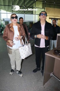 Bollywood Superstar Govinda Surprised by Photographers with a Birthday Cake at Airport on December 20