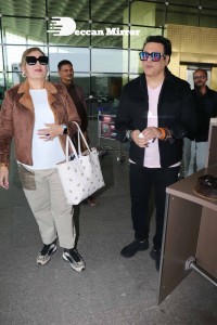 Bollywood Superstar Govinda Surprised by Photographers with a Birthday Cake at Airport on December 20