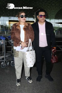 Bollywood Superstar Govinda Surprised by Photographers with a Birthday Cake at Airport on December 20