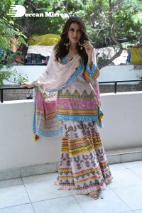 Actress Hansika Motwani smilingly poses for pictures