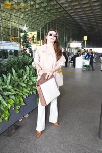 actress Hansika Motwani stylish looks in shirt and sunglasses