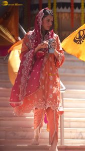 actress hansika motwani beautiful in a orange dress