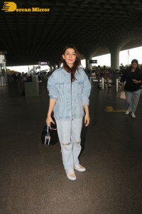 Actress Hansika Motwani in denim jeans and denim jacket at the airport