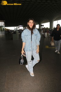 Actress Hansika Motwani in denim jeans and denim jacket at the airport