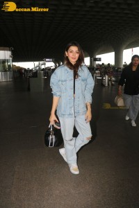 Actress Hansika Motwani in denim jeans and denim jacket at the airport