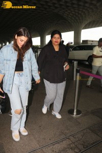 Actress Hansika Motwani in denim jeans and denim jacket at the airport