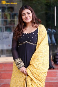 Actress Hebah Patel dressed in a black salwar kameez