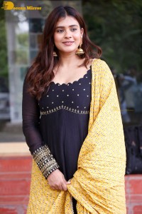 Actress Hebah Patel dressed in a black salwar kameez