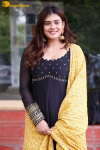 Actress Hebah Patel dressed in a black salwar kameez