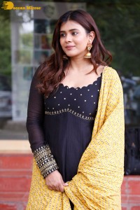 Actress Hebah Patel dressed in a black salwar kameez