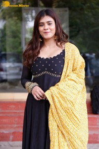 Actress Hebah Patel dressed in a black salwar kameez
