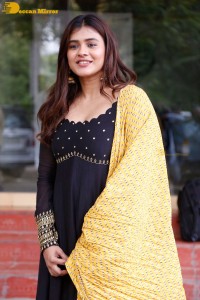 Actress Hebah Patel dressed in a black salwar kameez