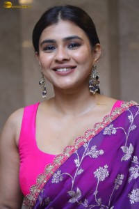 actress Hebah Patel stylish in a pink blouse and purple saree