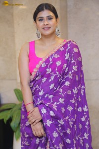actress Hebah Patel stylish in a pink blouse and purple saree