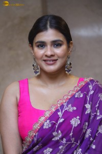 actress Hebah Patel stylish in a pink blouse and purple saree
