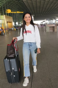 Helly Shah spotted at Mumbai Airport in white t-shirt and blue jeans