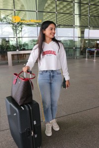Helly Shah spotted at Mumbai Airport in white t-shirt and blue jeans