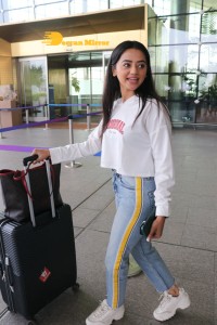 Helly Shah spotted at Mumbai Airport in white t-shirt and blue jeans