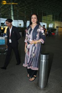 bollywood dream girl hema malini in a salwar dress at mumbai airport