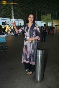 bollywood dream girl hema malini in a salwar dress at mumbai airport