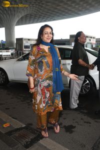 bollywood dream girl hema malini spotted at mumbai airport