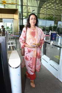 bollywood star actress hema malini spotted at mumbai airport