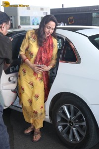 bollywood actress and politician hema malini spotted at mumbai airport