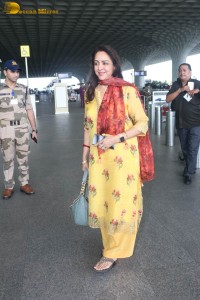 bollywood actress and politician hema malini spotted at mumbai airport