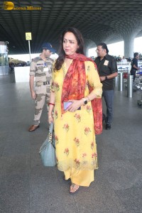 bollywood actress and politician hema malini spotted at mumbai airport