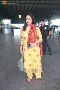 bollywood actress and politician hema malini spotted at mumbai airport