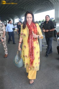 bollywood actress and politician hema malini spotted at mumbai airport