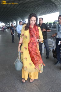 bollywood actress and politician hema malini spotted at mumbai airport