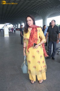 bollywood actress and politician hema malini spotted at mumbai airport
