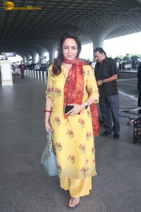 bollywood actress and politician hema malini spotted at mumbai airport