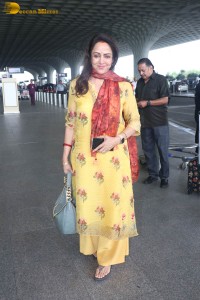 bollywood actress and politician hema malini spotted at mumbai airport