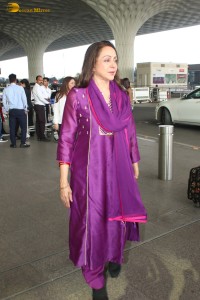 actress and politiican Hema Malini spotted at Mumbai Airport on Dec 26, 2023