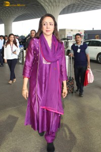 actress and politiican Hema Malini spotted at Mumbai Airport on Dec 26, 2023