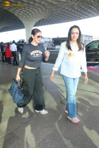 Actress Hema Malini and her daughter Esha Deol spotted at the Mumbai Airport on Jan 23, 2024