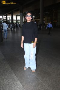 Indian actress hina khan in black t-shirt and denim jeans at airport