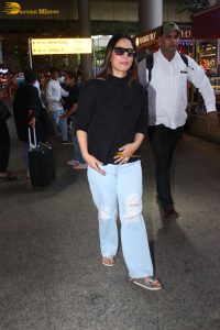 Indian actress hina khan in black t-shirt and denim jeans at airport