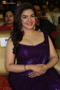 actress honey rose glamorous look in a purple dress at a function