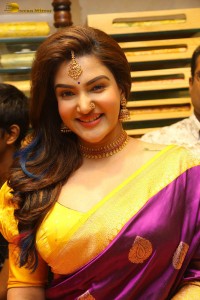 actress honey rose in a violet saree while inaugurating a shopping mall