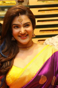 actress honey rose in a violet saree while inaugurating a shopping mall