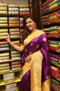 actress honey rose in a violet saree while inaugurating a shopping mall