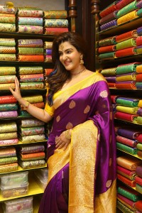 actress honey rose in a violet saree while inaugurating a shopping mall