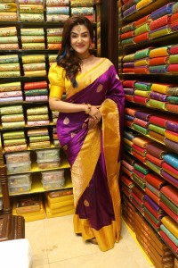 actress honey rose in a violet saree while inaugurating a shopping mall