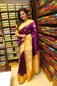 actress honey rose in a violet saree while inaugurating a shopping mall